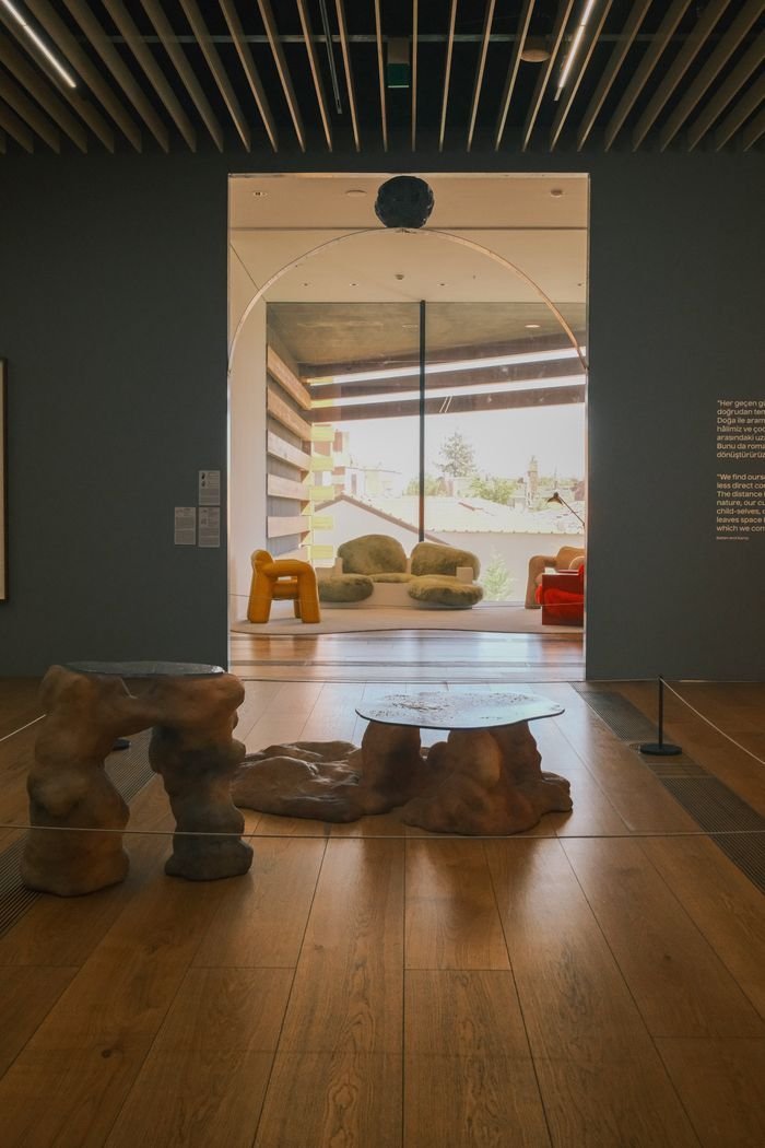 Contemporary gallery room featuring unique abstract furniture pieces and modern designs.